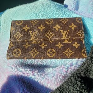 Authentic Louis Vuitton passport wallet. Lots of room, excellent condition